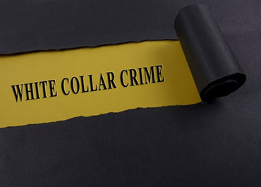 Torn black paper revealing 'WHITE COLLAR CRIME' on yellow, symbolizing hidden business fraud.